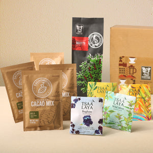 4pcs Cacaomistry Cacao Mix, 4pcs Tsaa Laya Tea Sachets, and 1pc Barista Beans 250g with a box.